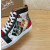 Christian Louboutin Printed Canvas Spiked‑Toe High‑Top Sneakers