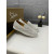 Christian Louboutin Iridescent Spike‑Decorated Slip‑On Sneakers