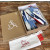 Christian Louboutin White‑Blue Denim Spiked Platform Low‑Top Sneakers