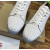 Christian Louboutin White Perforated Leather Green‑Accent White‑Spiked Low‑Top Sneakers