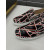 Christian Louboutin Black Patent Geometric‑Print Spiked Slip‑On Sneakers