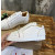 Christian Louboutin White Leather All‑Over Spike Low‑Top Sneakers