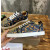 Christian Louboutin Navy Rope‑Print Gold‑Spiked Low‑Top Sneakers