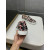 Christian Louboutin Black Patent Geometric‑Print Spiked Slip‑On Sneakers