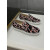 Christian Louboutin Black Patent Geometric‑Print Spiked Slip‑On Sneakers