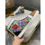 Christian Louboutin Multicolor Geometric Print High‑Top Sneakers