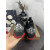 Christian Louboutin Black Silver‑Spiked Slip‑On Sneakers Red Shark‑Tooth Sole