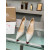 Christian Louboutin Silver Textured Scalloped 100mm heel Pump