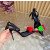 Christian Louboutin Black Satin Multicolor Fabric Flower 100mm Stiletto Heel Slingback Pumps