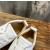 Christian Louboutin White Perforated White‑Spiked Low‑Top Sneakers