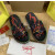 Christian Louboutin Black Graffiti‑Print Slides Rainbow Crystal‑Trimmed Sole