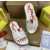 Christian Louboutin White Heart‑Graffiti Print Slides Rainbow Crystal‑Trimmed Sole