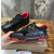Christian Louboutin Black‑Red Spiked Platform Low‑Top Sneakers