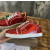 Christian Louboutin Red Metallic Patent Spike‑Toe Low‑Top Sneakers