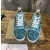 Christian Louboutin Holographic Blue Black‑Spiked Low‑Top Sneakers