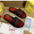 Christian Louboutin Black Slide Sandals With Red Embossed Signature Logo