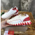 Christian Louboutin White Leather Red‑Trim Spiked Slip‑On Sneakers