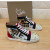 Christian Louboutin Printed Canvas Spiked‑Toe High‑Top Sneakers