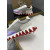 Christian Louboutin Holographic‑Toe Shark Tooth Sole Low‑Top Sneakers