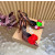 Christian Louboutin Burgundy Satin Multicolor Fabric Flower 100mm Stiletto Heel Slingback Pumps