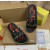 Christian Louboutin Black Heart‑Graffiti Print Slide Sandals Rainbow Crystal‑Trim Sole
