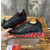Christian Louboutin Black Leather Red‑Trim Spiked Slip‑On Sneakers