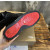 Christian Louboutin Black CL‑Logo Spiked Low‑Top Sneakers