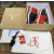 Christian Louboutin Navy‑Red Suede Gold‑Logo Shark‑Tooth Sole Lace‑Up Sneakers