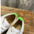 Christian Louboutin White Perforated Leather Green‑Accent White‑Spiked Low‑Top Sneakers