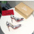 Christian Louboutin Monochrome Letter‑Print Pointed Toe 100mm Stiletto heel Pumps