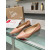 Christian Louboutin Nude Patent Leather Pointed‑Toe Low‑Wedge Heel Flats
