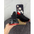 Christian Louboutin Black Spiked‑Sole Chunky Lace‑Up Sneakers With Red Lining