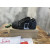 Christian Louboutin Black CL‑Logo Spiked Low‑Top Sneakers