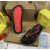 Christian Louboutin Black Graffiti‑Print Slides Rainbow Crystal‑Trimmed Sole