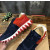 Christian Louboutin Navy‑Red Suede Gold‑Logo Shark‑Tooth Sole Lace‑Up Sneakers