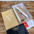Christian Louboutin Taupe Nubuck Metal‑Bar Slip‑On Loafers