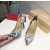 Christian Louboutin Monochrome Letter‑Print Pointed Toe 100mm Stiletto heel Pumps