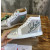 Christian Louboutin Grey Canvas Silver Spiked High‑Top Sneakers