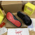 Christian Louboutin Black Grain‑Leather Spiked Flat Slide Sandals
