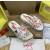 Christian Louboutin White Graffiti‑Print Slides Rainbow Crystal‑Trimmed Sole