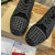 Christian Louboutin Black CL‑Logo Spiked Low‑Top Sneakers