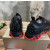 Christian Louboutin Black Leather Red‑Trim Spiked Slip‑On Sneakers