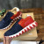 Christian Louboutin Navy‑Red Suede Gold‑Logo Shark‑Tooth Sole Lace‑Up Sneakers