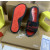 Christian Louboutin Black Slide Sandals With Red Embossed Signature Logo