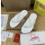Christian Louboutin White Embossed‑Logo Studded Flip‑Flop Sandals