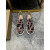 Christian Louboutin Black Patent Geometric‑Print Spiked Slip‑On Sneakers