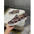 Christian Louboutin Black Patent Geometric‑Print Spiked Slip‑On Sneakers