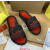 Christian Louboutin Black Slide Sandals With Red Embossed Signature Logo