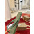Christian Louboutin Sage Green Rubber Stud‑Decorated Flip‑Flops