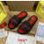 Christian Louboutin Black Slide Sandals With Red Embossed Signature Logo